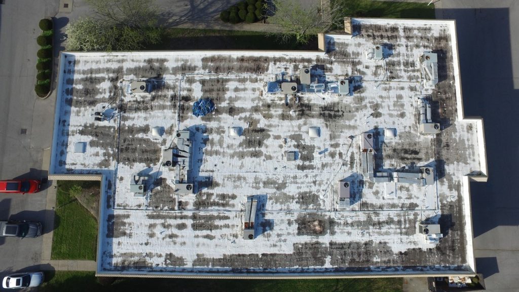 Distressed commercial roof using infrared drone